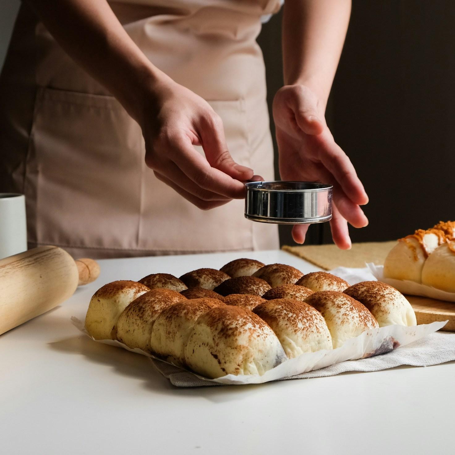 Community members collaborating in a modern kitchen space, sharing recipes and techniques